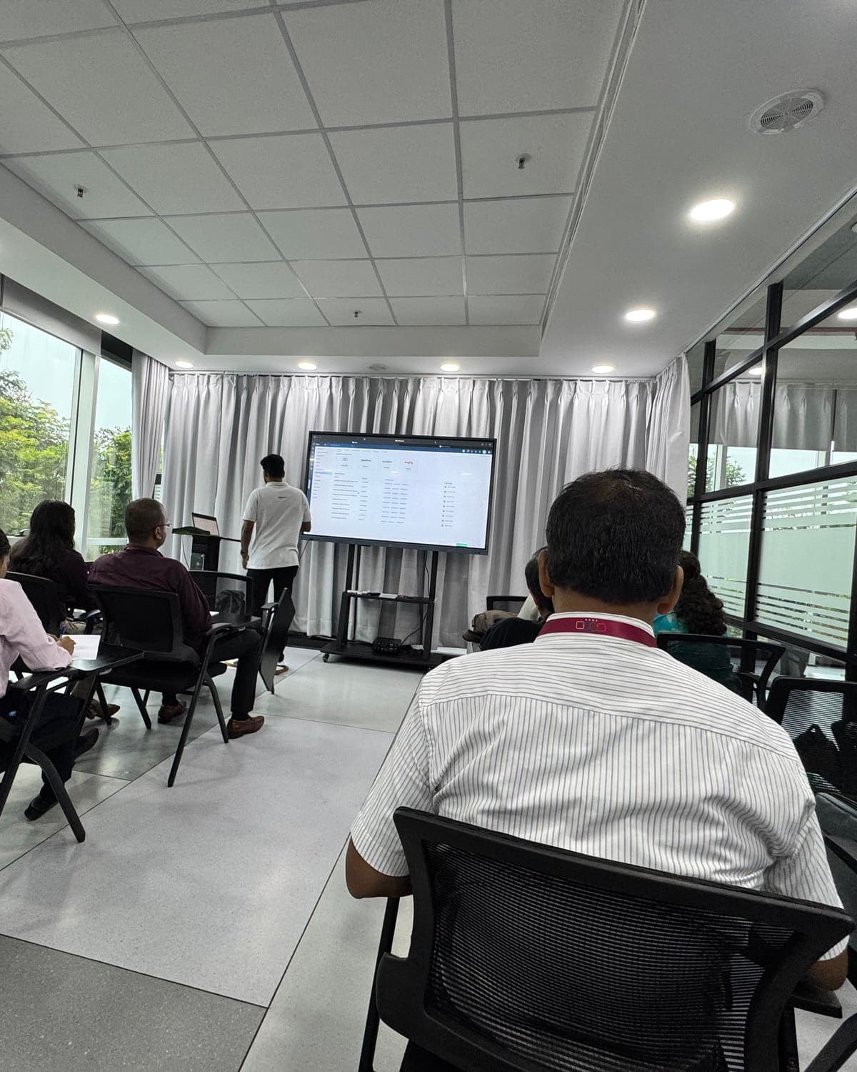 Product training session in the Techimpace training room — a team member presenting the platform to colleagues